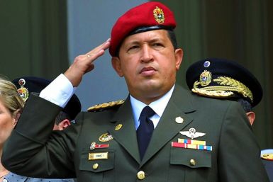 Then Venezuelan president Hugo Chavez salutes during a ceremony in Caracas in February 2001