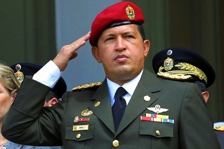 Then Venezuelan president Hugo Chavez salutes during a ceremony in Caracas in February 2001