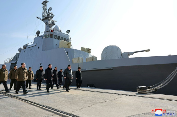 An undated photo released by North Korea's official Korean Central News Agency on February 2, 2024 shows leader Kim Jong Un (2nd from R) at the Nampo Dockyard