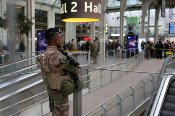 A French soldier stands guard after a knife attack at Paris's Gare de Lyon railway station