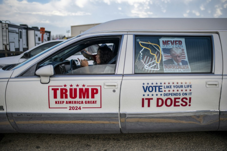 Many of those taking part in the immigration protest in Quemado, Texas had signs proclaiming support for former US president Donald Trump