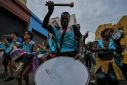 Revelers take part in a street carnival in Sao Paulo, Brazil, on February 3, 2024, in a neighborhood nicknamed Cracolandia due to the large number of crack addicts living there