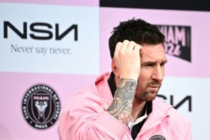 Lionel Messi talks to reporters in Tokyo two days after being booed off for sitting out a pre-season friendly in Hong Kong