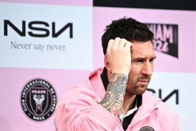 Lionel Messi talks to reporters in Tokyo two days after being booed off for sitting out a pre-season friendly in Hong Kong