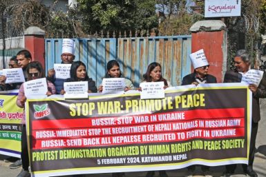Human rights activists protest outside the Russian Embassy in Kathmandu on February 5, 2024, to protest the recruitment of Nepali nationals into the Russian army
