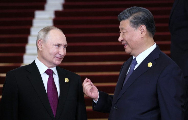 Xi and Putin denounced US 'interference' in their call, the Kremlin said