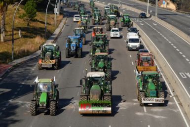 Farmers protesting on a motorway near Barcelona on Wednesday