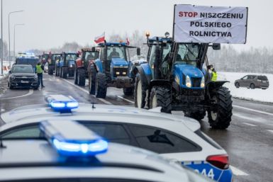 A banner reading 'Stop destroying the Polish agriculture' at the Polish-Ukrainian border crossing in Dorohusk, eastern Poland, on Friday