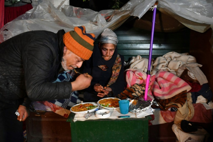 Leila and another Tunis homeless person share the Friday night dinner offered by the 'Restaurant of Love'