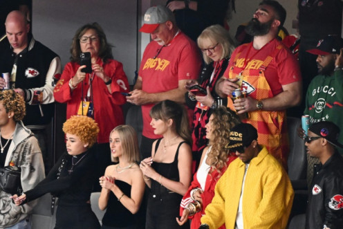 Singer-songwriter Taylor Swift is flanked by rapper Ice Spice, actress Blake Lively, Jason Kelce, Donna Kelce and Ed Kelce at Super Bowl LVIII between the Kansas City Chiefs and the San Francisco 49ers