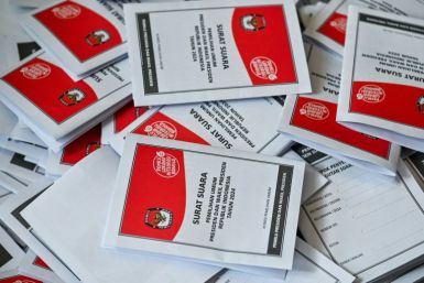 Observers say candidates or their agents stuff envelopes with cash or other gifts and hand them to Indonesians in a bid to influence their vote