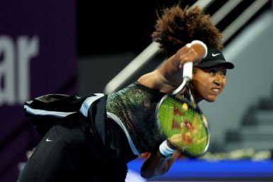 Naomi Osaka serving her way past Caroline Garcia and in to the Qatar Open second round