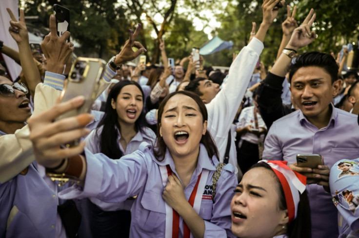 Prabowo's supporters gathered outside his home to celebrate his apparent victory in the presidential election