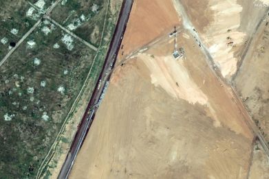 A satellite picture shows machinery building a wall along the Egypt-Gaza Strip border in Rafah, Egypt