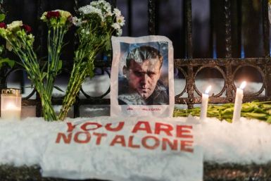 Navalny's supporters left candles, flowers and photos outside the Russian embassy in Oslo