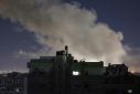 Smoke billows over buildings during Israeli bombardment in the Rafah area of the southern Gaza Strip
