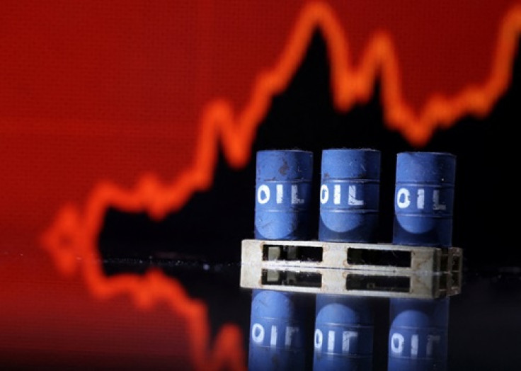 Oil barrels in front of rising stock graph (representational image)