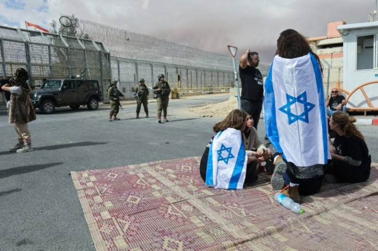 Dozens of Israelis blocked Gaza-bound aid trucks from entering through the Nitzana crossing with Egypt