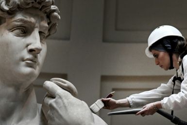 Italian restorer Eleonora Pucci cleaning David
