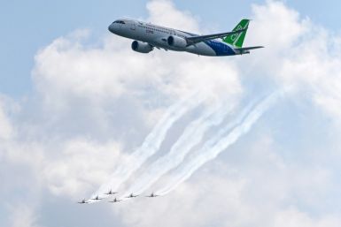 The C919 (top, with the RAAF Roulettes aerobatic team performing in Pilatus PC-21s) will take part in daily flying dispalys at the airshow