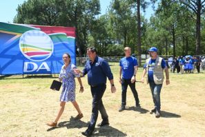 The opposition Democratic Alliance (DA), led by John Steenhuisen (2nd L), senses an opportunity to dent the ANC's grip on power but is seen by some as a party for white voters