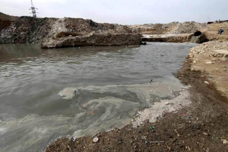 Stricken by drought, Iraq's already-dwindling rivers are suffocating under medical waste and sewage contamination