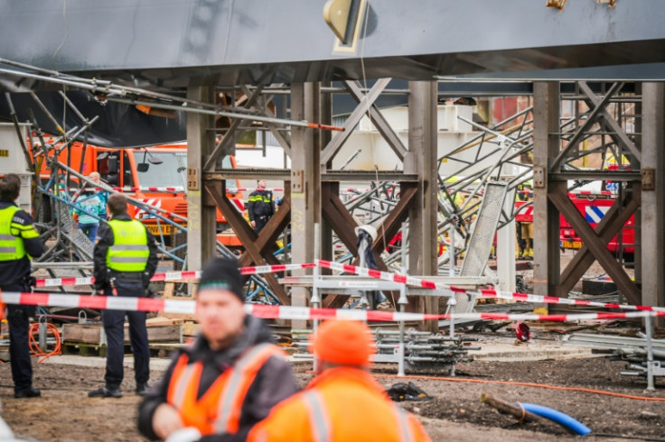 A local reporter at the scene said workmen had been hoisting bridge arches when the accident happened