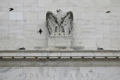 Fed officials were divided over the risks of cutting interest rates too soon or too late, according to minutes of the most recent meeting