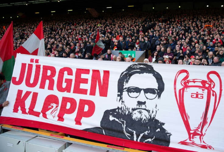 Fans favourite: Liverpool supporters display a banner featuring Liverpool's German manager Jurgen Klopp