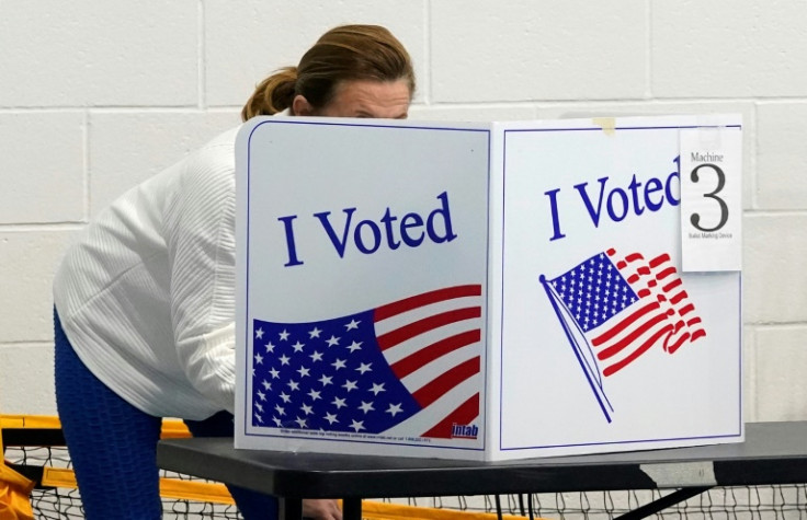 A voter prepares to cast a ballot at Meadowfield Elementary School in Columbia, South Carolina on February 24, 2024
