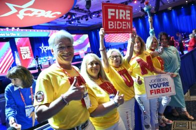 Supporters of former US president and 2024 presidential hopeful Donald Trump attend the CPAC gathering in National Harbor, Maryland