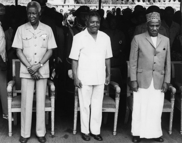Hand-picked by independence hero Julius Nyerere (L) to succeed him, Mwinyi (C) inherited a country in the grip of an economic crisis