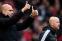 Thumbs up: Manchester City manager Pep Guardiola (left) pits his wits against Manchester United boss Erik ten Hag