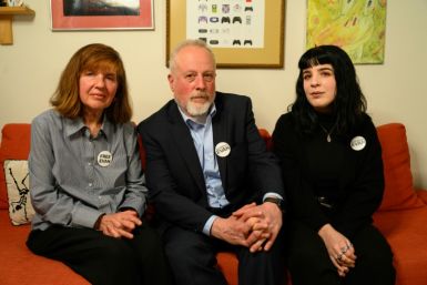 Ella, Danielle and Mikhail Gershkovich -- mother, sister and father to detained journalist Evan Gershkovich -- sit for a portrait in Danielle's apartment in Philadelphia, Pennsylvania