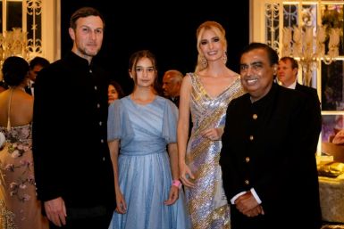 Donald Trump's daughter Ivanka (2R) and husband Jared Kushner (L) are among those attending the pre-wedding celebration hosted by billionaire Mukesh Ambani (R)