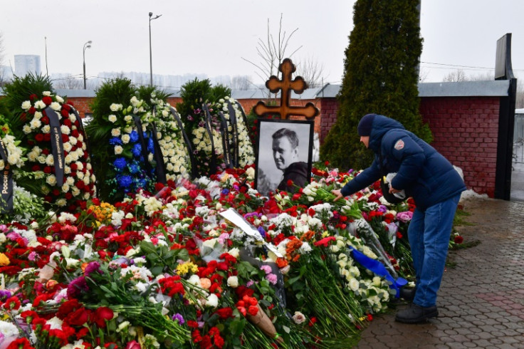 Mourners laid flowers on Navalny's grave, after his funeral brought thousands to the streets