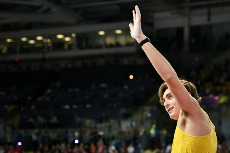 Sweden's Armand Duplantis celebrates after winning the world indoor pole vault