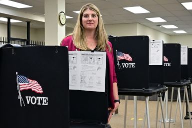 Joanna Francescut, the election registrar in California's Shasta County,  stands in a voting precinct in Redding on February 24, 2024
