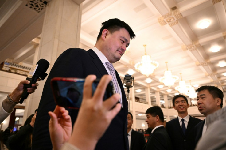 Basketball legend Yao Ming towered over fellow attendees
