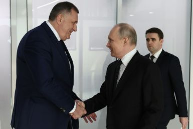 Bosnian Serb leader Milorad Dodik is greeted by Russian President Vladimir Putin in Kazan last month