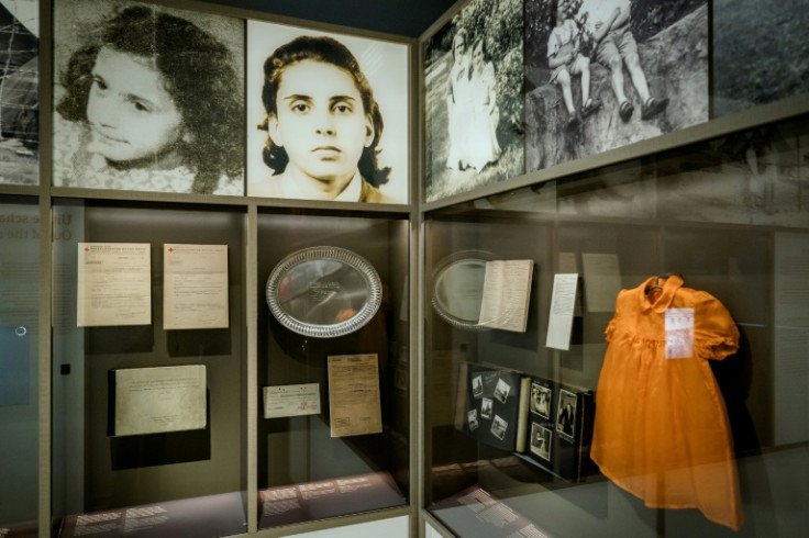 Exhibits at the new Holocaust museum include portraits and clothing of Dutch Jewish victims