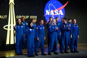 Astronaut graduates from the United States and United Arab Emirates during a ceremony at the NASA Johnson Space Center