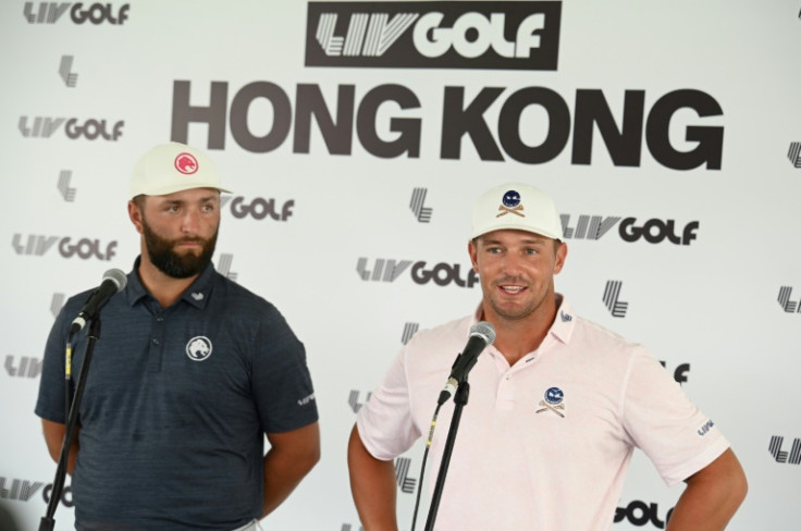 Jon Rahm (left) and Bryson DeChambeau talk to reporters ahead of LIV Hong Kong which begins on Friday