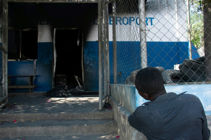 Gangs attacked key sites in Haiti including the airport, a police academy and prisons from which thousands of inmates were able to escape