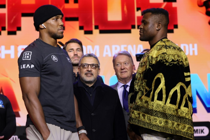 Desert duel: Anthony Joshua (left) and Francis Ngannou