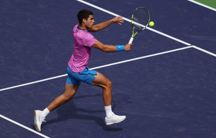 Spain's Carlos Alcaraz plays a backhand on the way to a third-round victory over Felix Auger-Aliassime of Canada at the WTA-ATP Indian Wells Masters