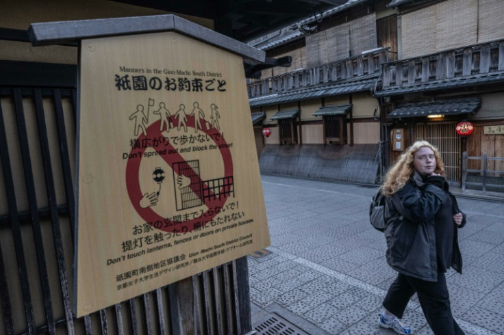 Some tourists questioned restricting their movement in Kyoto's Gion district