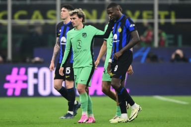 Atletico Madrid's French forward Antoine Griezmann (C) is in line to return to face Inter Milan on Wednesday in the capital