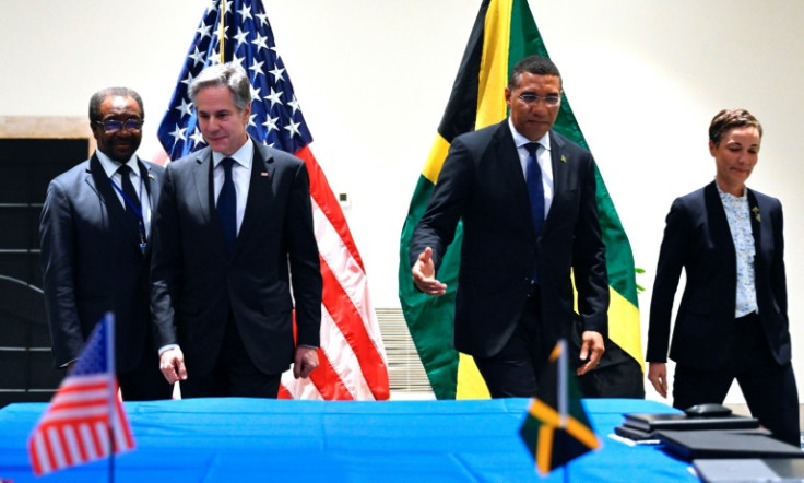 US Secretary of State Antony Blinken (second to left) meets with Jamaican Prime Minister Andrew Holness (2R), Jamaican Foreign Minister Kamina Johnson Smith (R) and US Ambassador to Jamaica N. Nick Perry at a crisis meeting in Kingston on Haiti