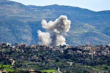Smoke billows from the site of an Israeli airstrike in southern Lebanon